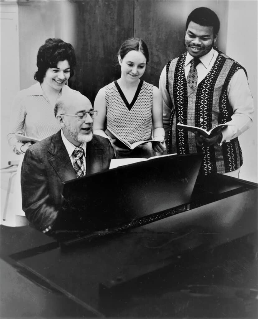 Dr. Lloyd Pfautsch / Dr. Lloyd Pfautsch is seated with (from left to right) Rose Benedetto, Mary Fuller, and Donnie Albert in this file photo. (The SMU Choral Union). Photo by (Courtesy Photo / digital file)