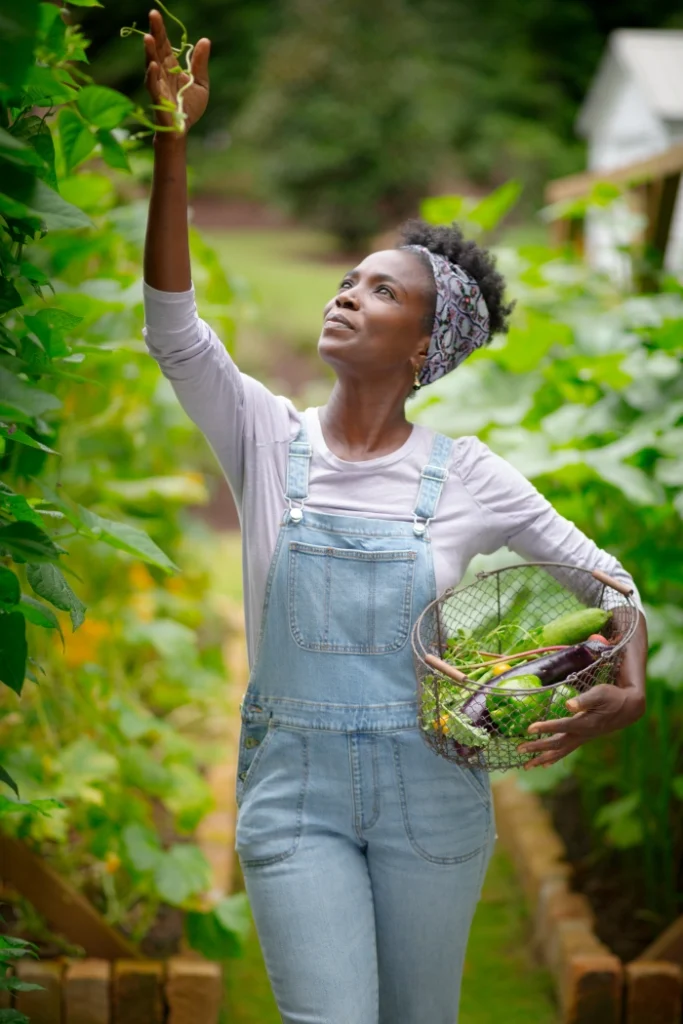 Jamila Norman / Jamila Norman explores the Trizzino garden. Photo by MAGNOLIA NETWORK