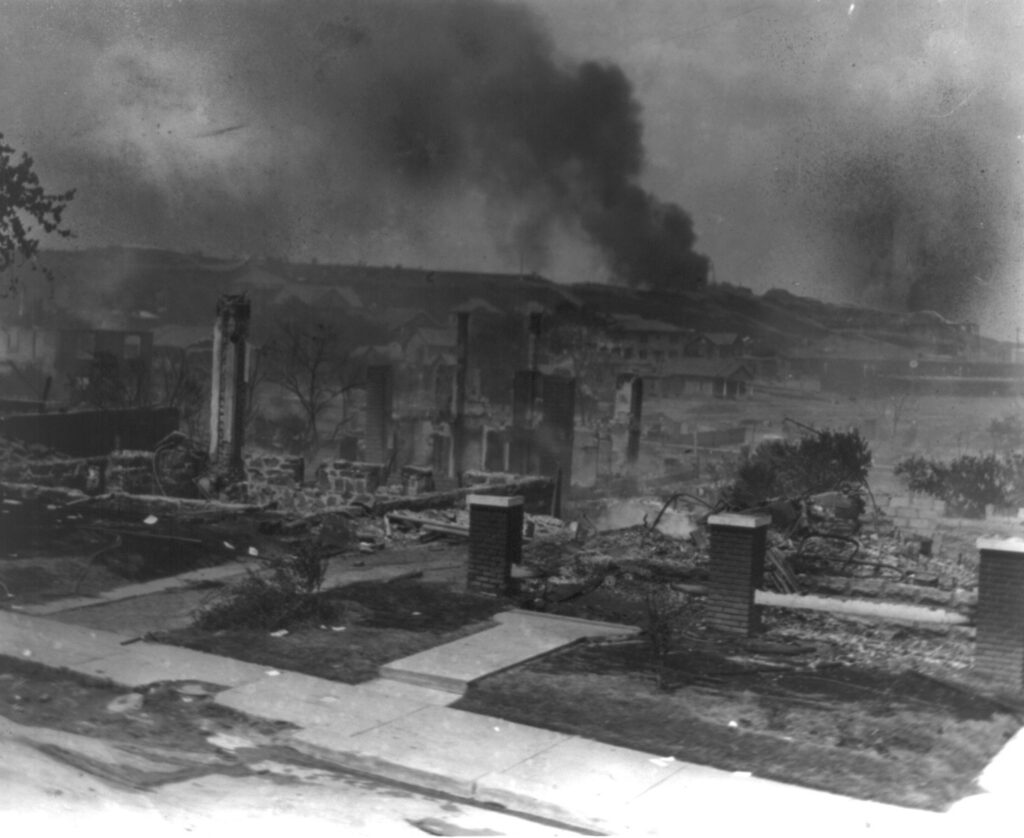 Tulsa Race Massacre / Homes destroyed in the Tulsa (Oklahoma) Race Massacre smoulder. Photo by Alvin C. Krupnick, Library of Congress