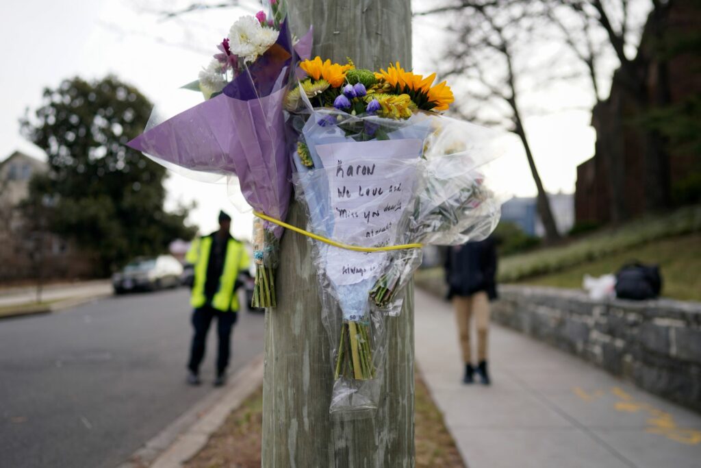 Flowers / On Jan. 10, flowers were secured to a pole as a tribute to Karon Blake, 13, on the intersection of Quincy Street NE and Michigan Avenue NE in Washington, D.C.'s Brookland area. "Karon, we will love and miss you dearly," the note says. Karon Blake was shot and murdered in the early morning hours of January 7 on the 1000 block of Quincy Street NE. Photo by AP Photo/Carolyn Kaster