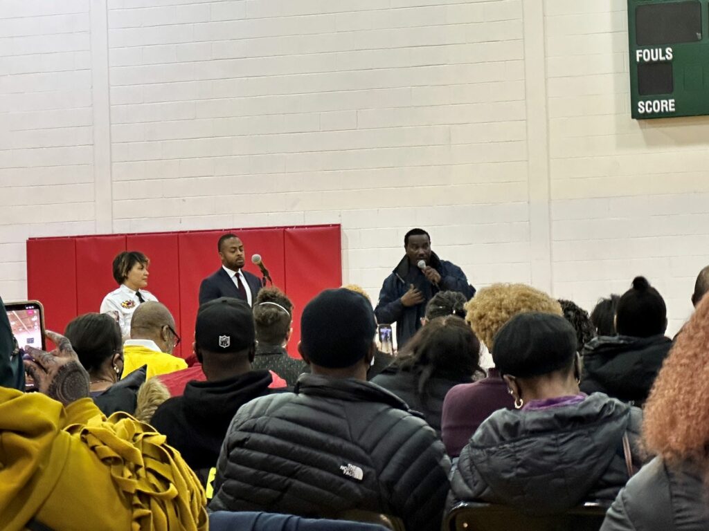 Morgan Kane / At a recent town hall community gathering, Assistant Police Chief Morgan Kane, Ward 5 Councilmember Zachary Parker, and Karon Blake's grandpa, Sean Long, were present. Photo by Nisa Islam Muhammad