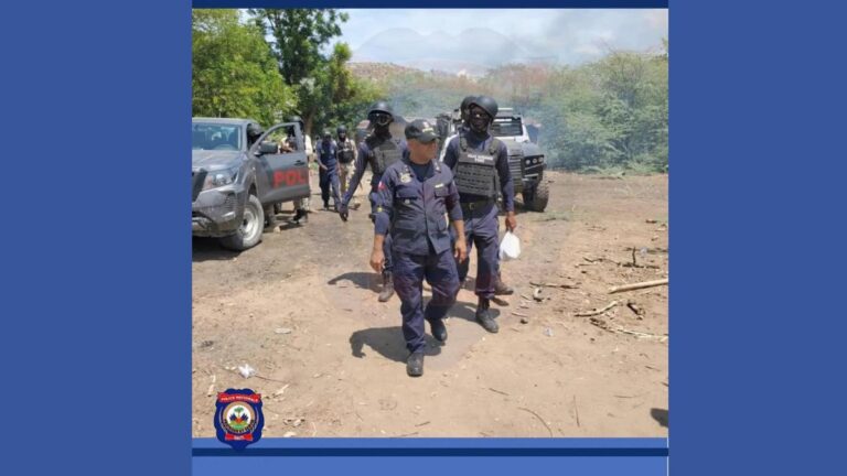 Haitian police raid violent areas, urge caution